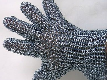 A galvanized fiver-finger style chainmail glove with short sleeve.